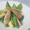 Ceasar salad in white plate